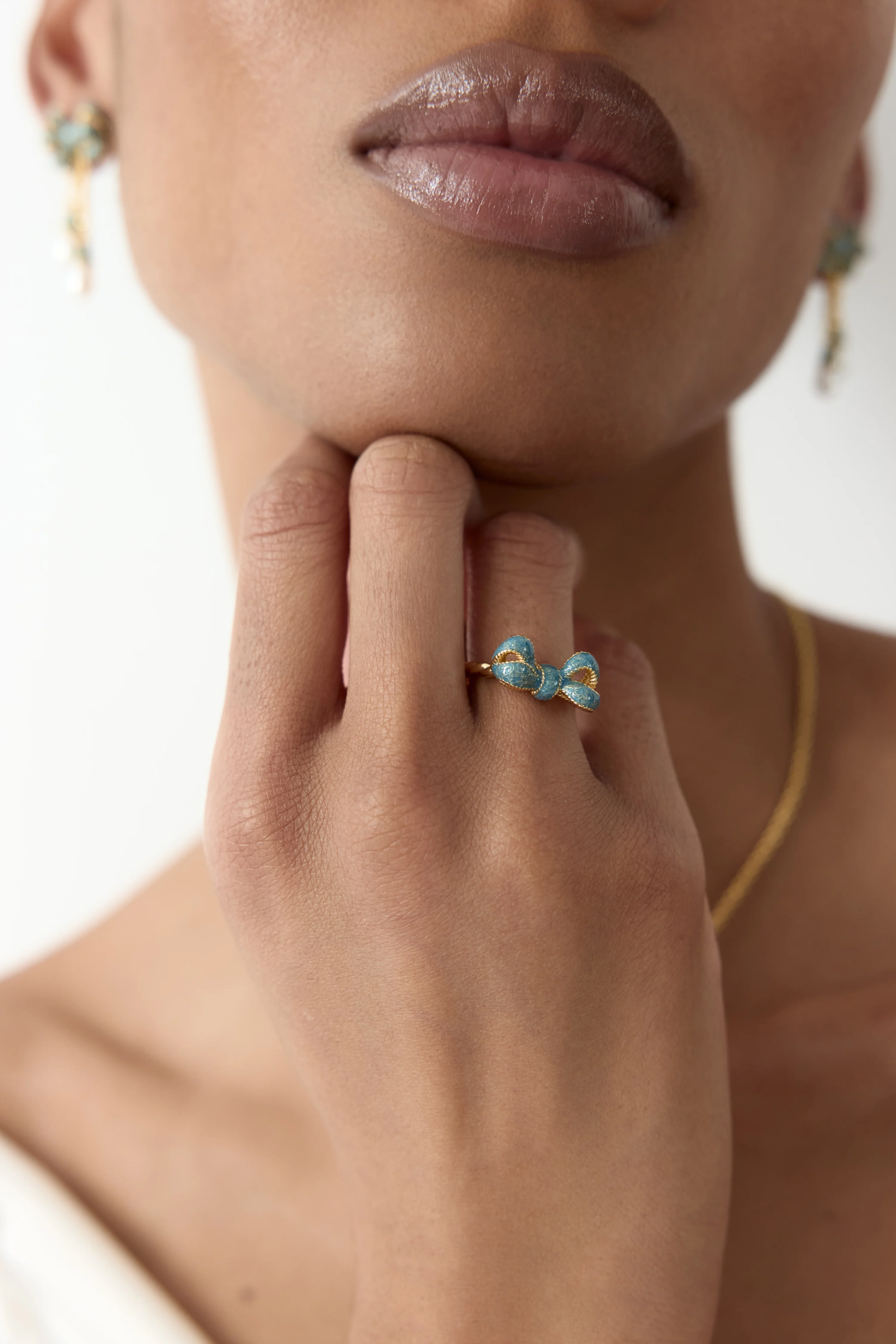 Bague nœud bleu et motifs floraux dorés - Image 8