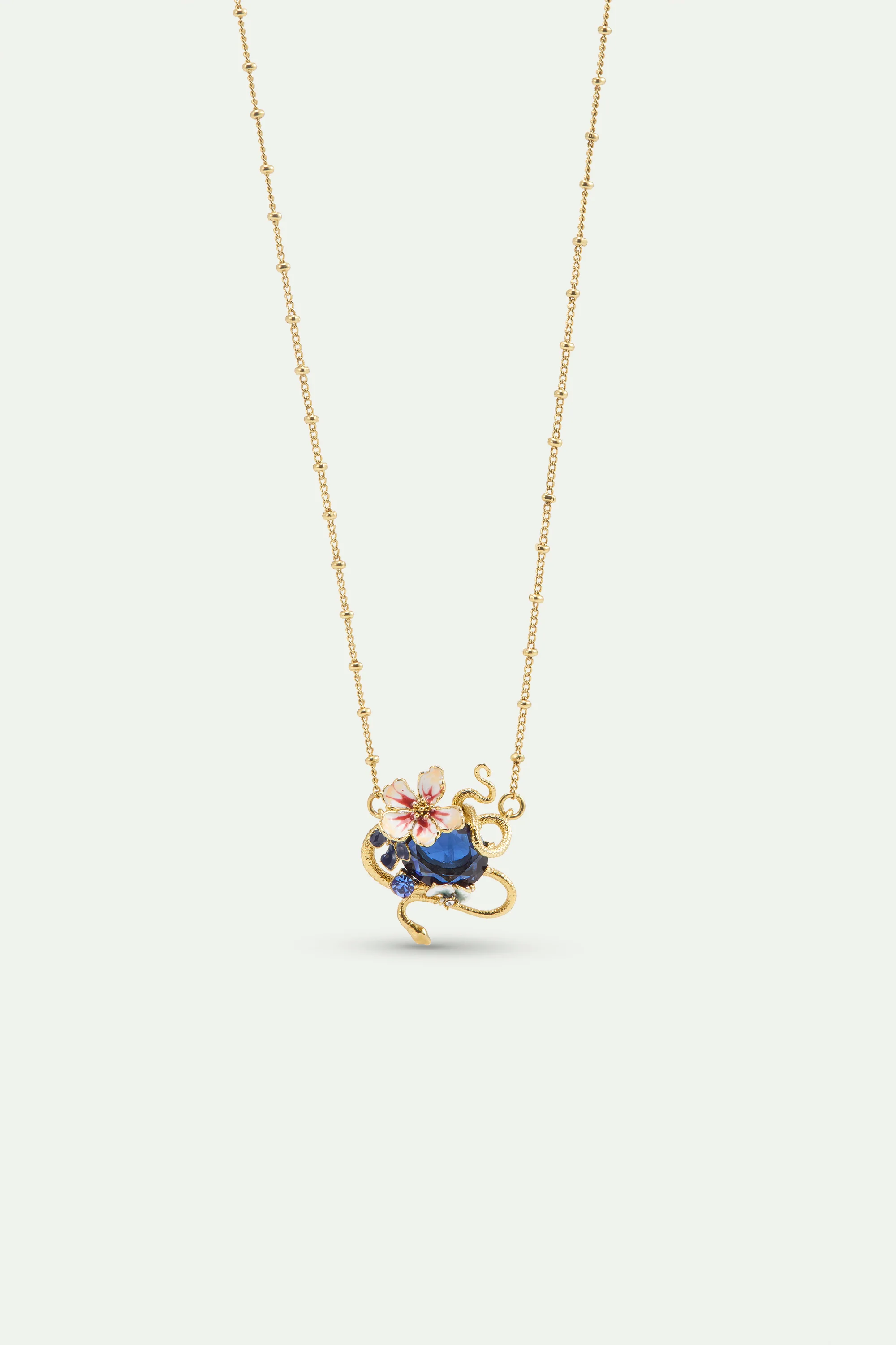 Collier pierre facettée bleue, serpent doré et fleurs de Mauve
