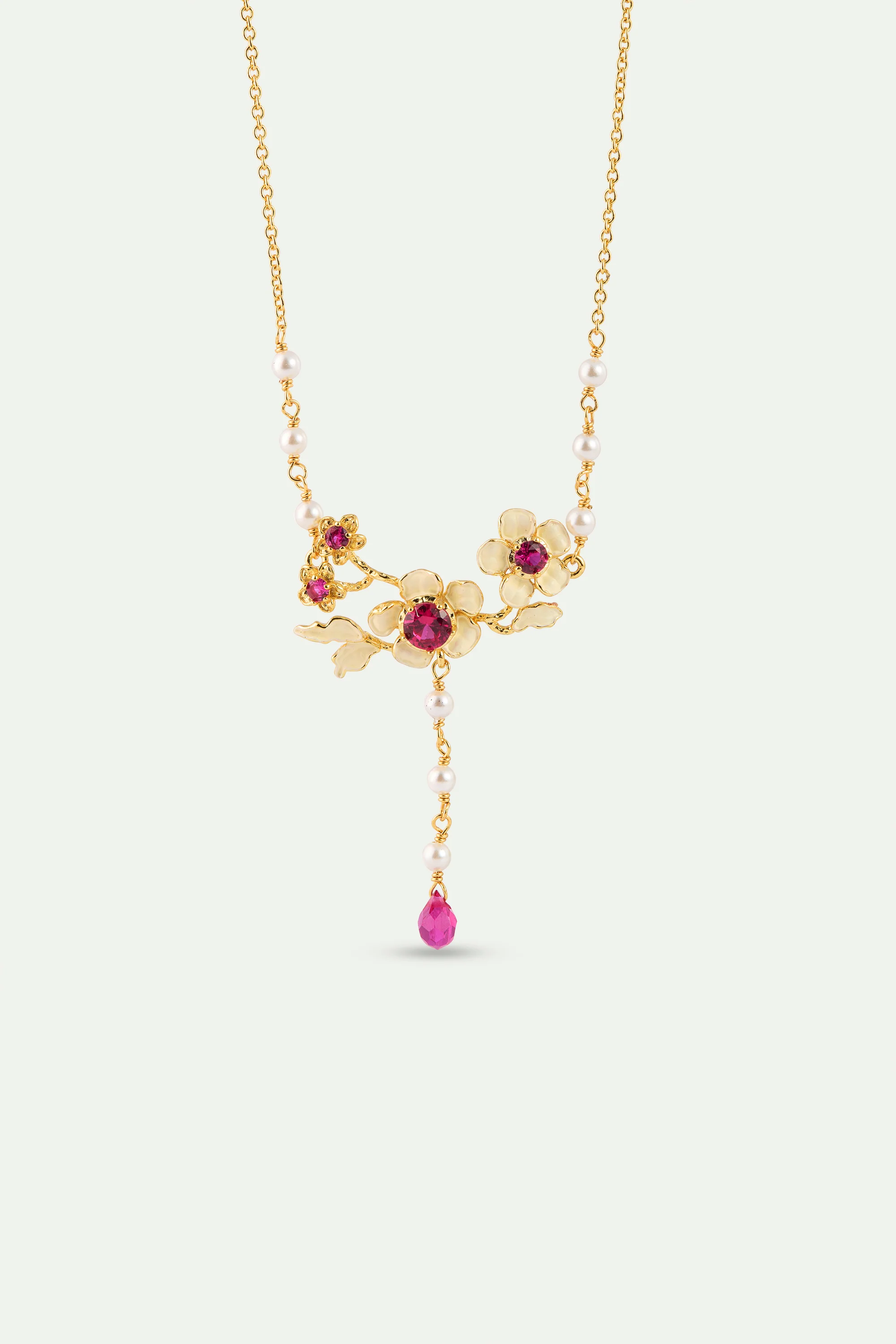Collier plastron anémones dorées, cristaux roses et perles de culture