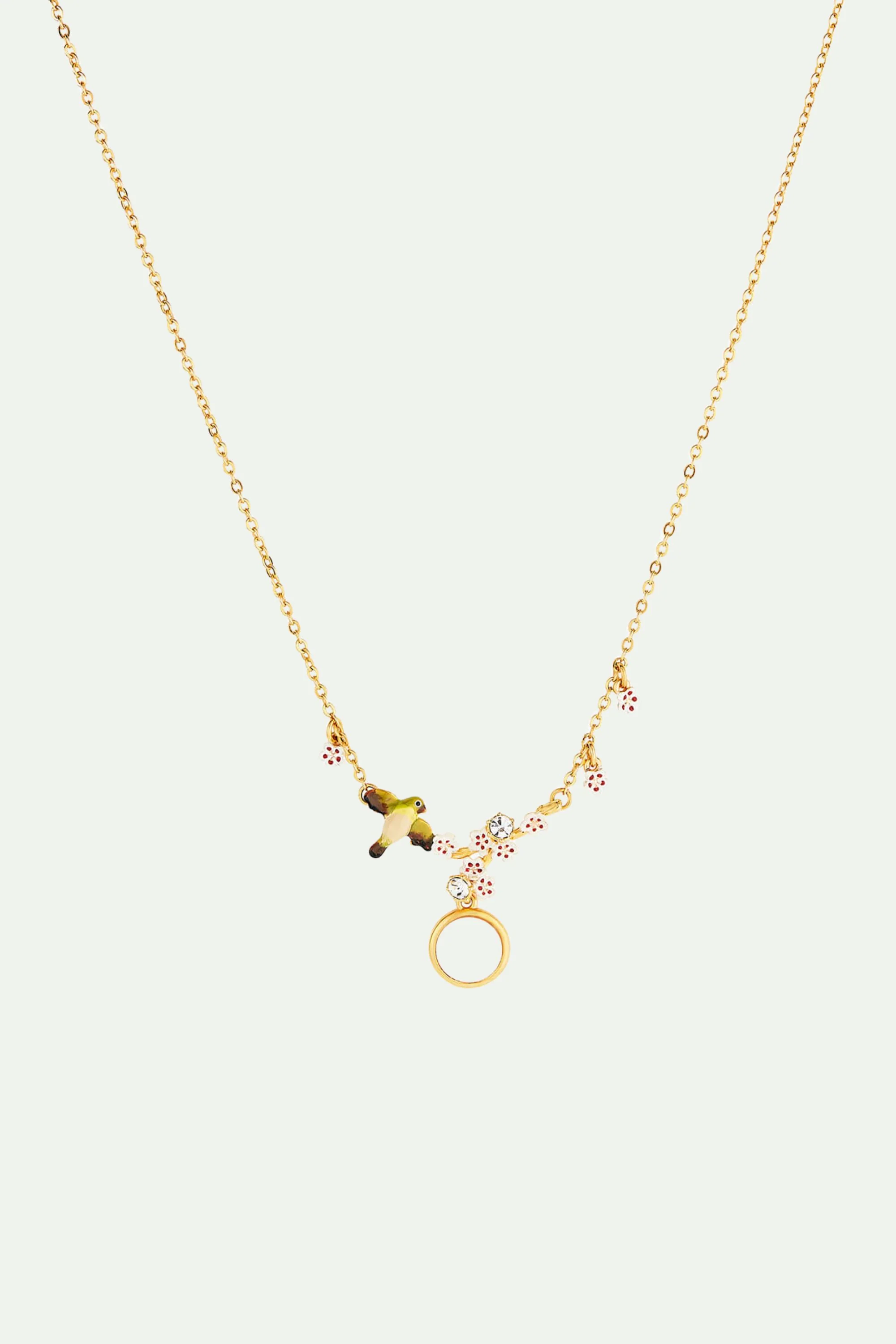 Collier plastron cabochon de nacre, oiseau, fleur de cerisier et cristaux